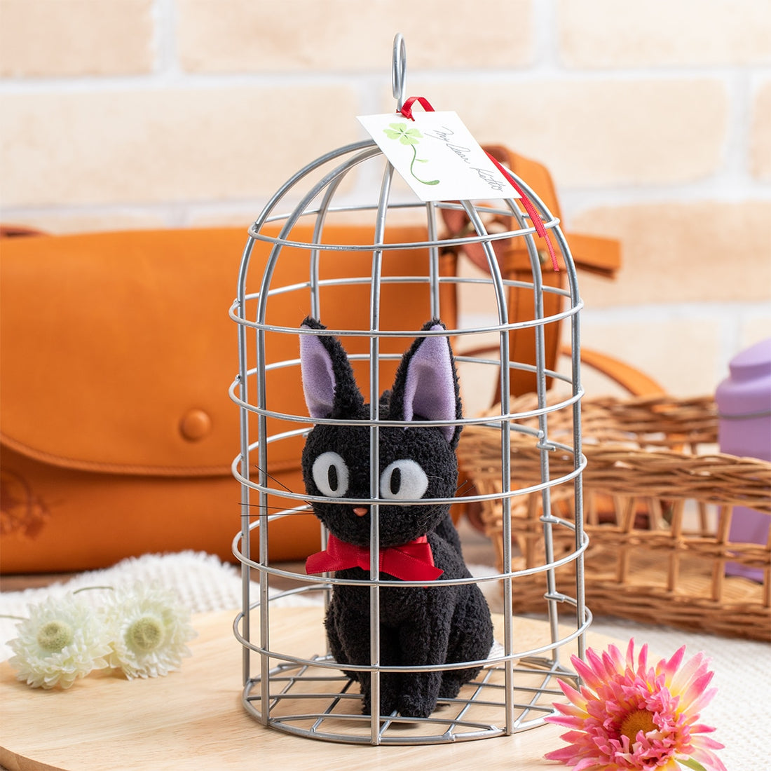 Kiki's delivery service Jiji plush in the cage